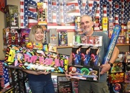 Fireworks are fun! Becky White and Castle of Muskogee Co-owner Matt Hiller show off a few of the new 2024 fireworks. Value News Magazine & Values, Inc. photo, June 2024.