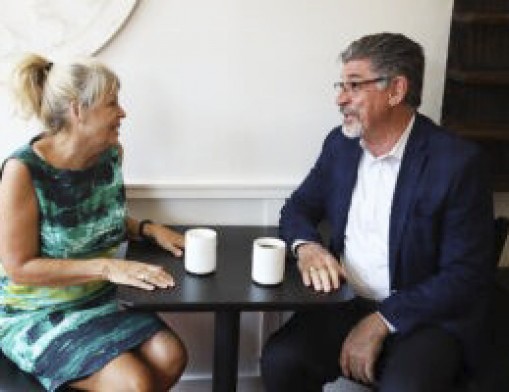 She Brews founder Rhonda Bear (left) visits with RSU Interim President Dr. Mark Rasor. Photo courtesy of Better Together in Rogers Count.