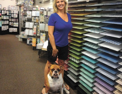 Jerri Ann Currey and Teddy will miss their loyal customers at The Scrapbook Store.