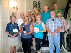 The Wine & Roses committee includes (L to R): (Front row) Deb Kirkpatrick, Dixie Bohannon, Lynn Wheatley, Scott Davidson, (Middle row) JoAnn White, Tracy Winters-Stow, Barbie Raney, (Back row) Mary Lou Havener, Rebecca Fernandez, David White and George Harrington.