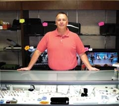 Andrew Ross, owner of Rogers County Pawn, is ready to help customers with buying, selling or pawning high quality ­
pre-owned items.