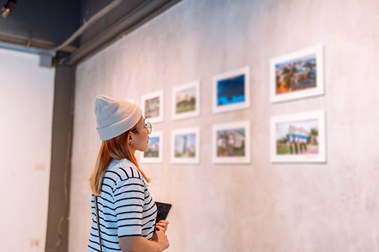 Woman viewing an art gallery